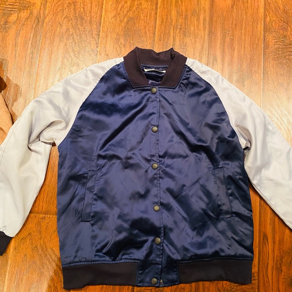 Brand new jacket fits around medium